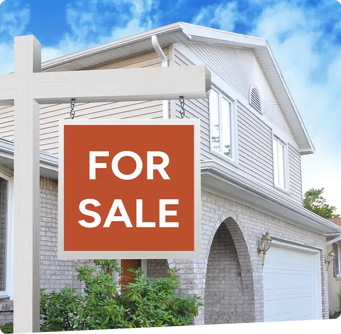 FOR SALE sign posted infront of a house